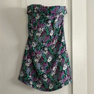 Silk like floral mini dress. Strapless and zip back.